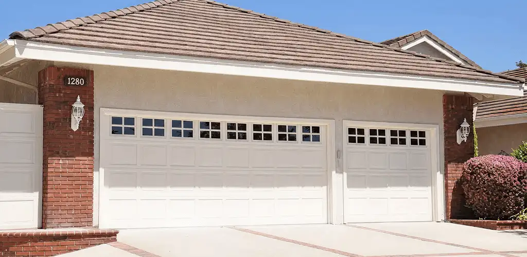 Residential garage door repair service for a double garage door in Miami, FL