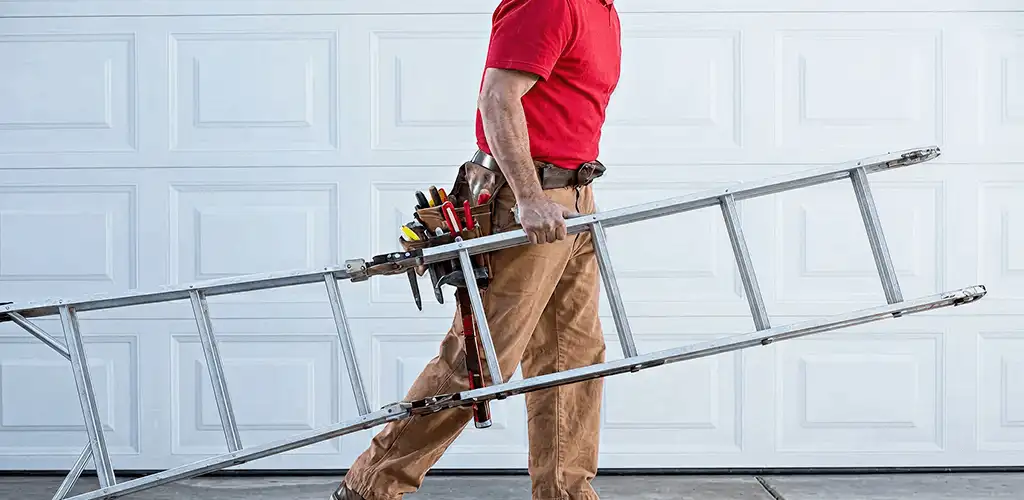 Garage door repair technician arriving with tools and ladder in Miami, FL