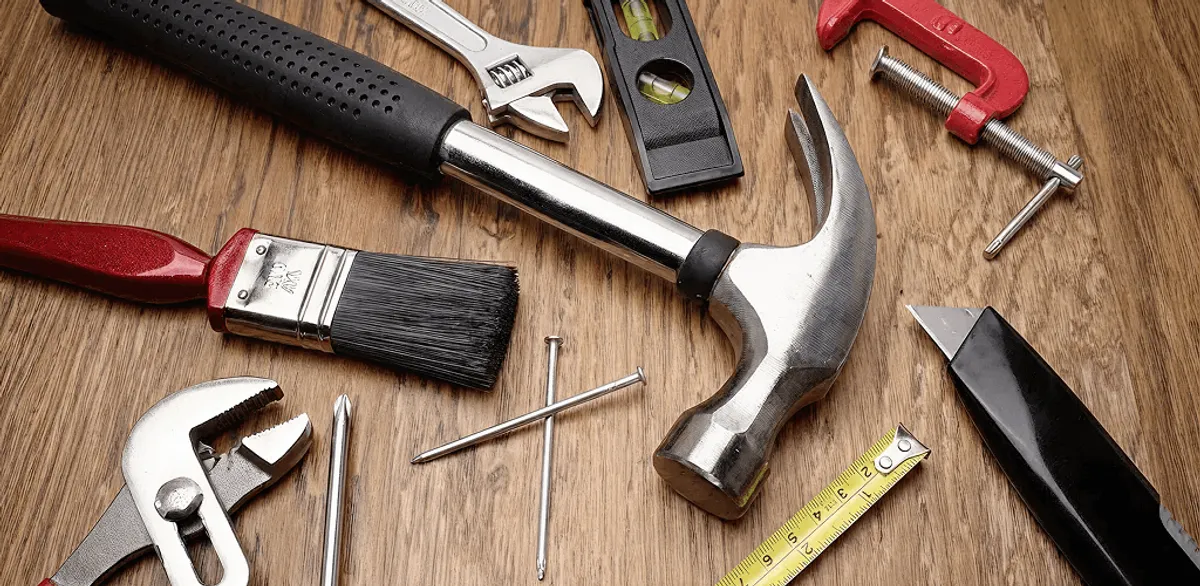 Handyman tools laid out for home repair and maintenance work in Miami, FL