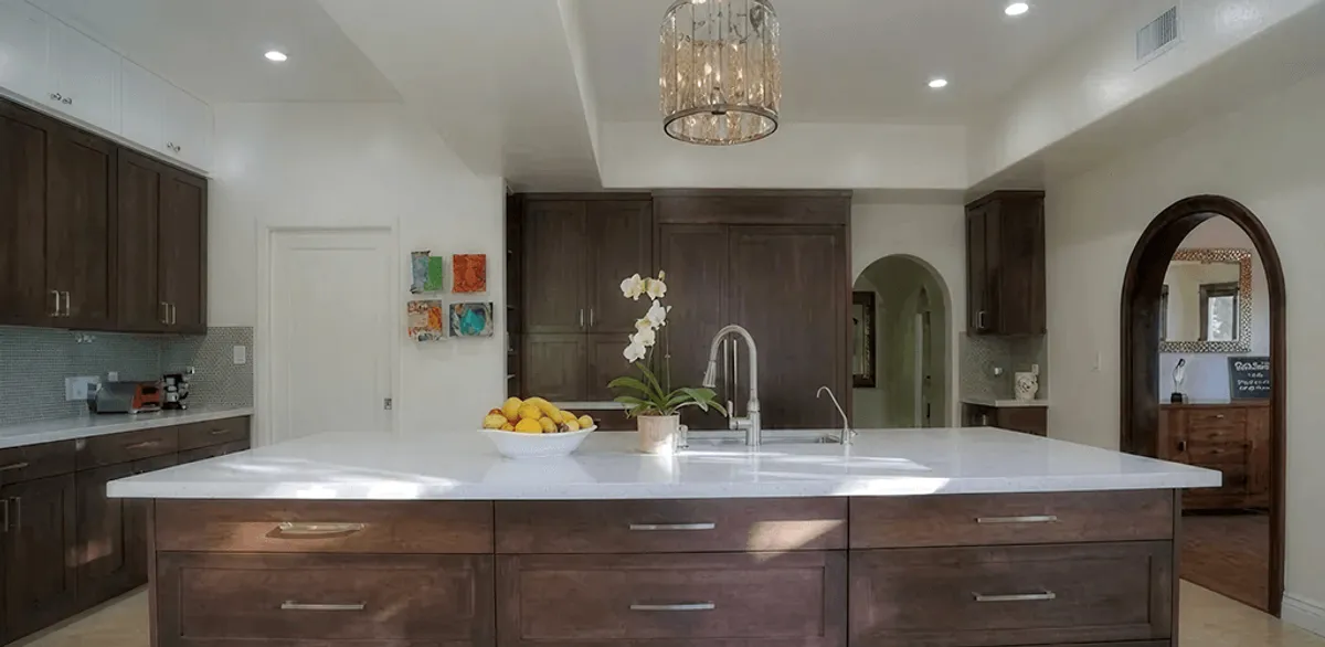 Cabinet refacing project with updated kitchen cabinets and island in Miami, FL